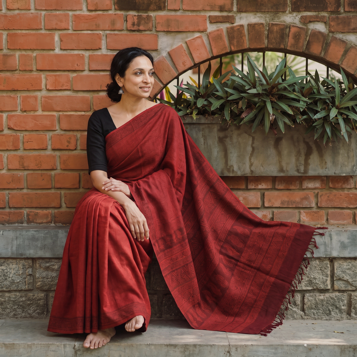 Red Handwoven Merino Wool Natural Dyed Hand Block Print Bagh Saree, draped and worn by a woman, AI visual of the saree, iTokri