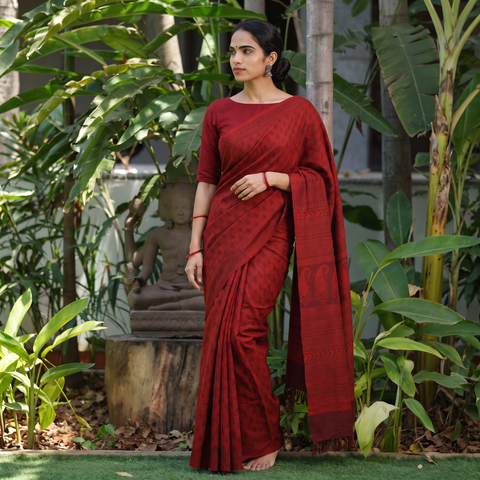 Red Handwoven Merino Wool Natural Dyed Hand Block Print Bagh Saree, draped and worn by a woman, AI visual of the saree, iTokri