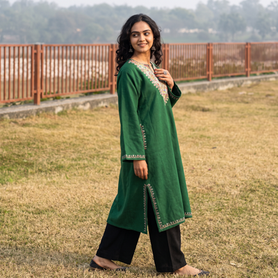 Green Handwoven Sozni Hand Embroidered Kashmiri Merino Wool Pheran, worn by a model, AI visual of the pheran, iTokri