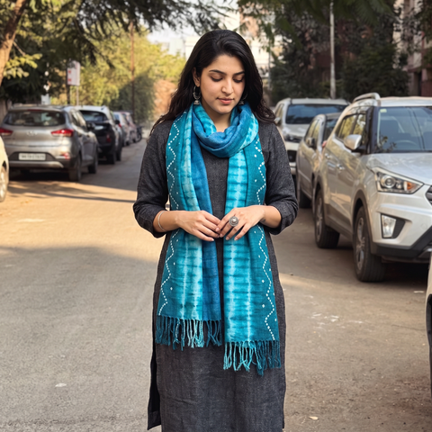 Blue Handwoven Tie-Dye Merino Wool Shibori & Bandhani stole, worn by a woman, AI visual of the stole, iTokri