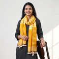 Yellow Handwoven Tie-Dye Merino Wool Shibori & Bandhani stole, worn by a woman, AI visual of the stole, iTokri