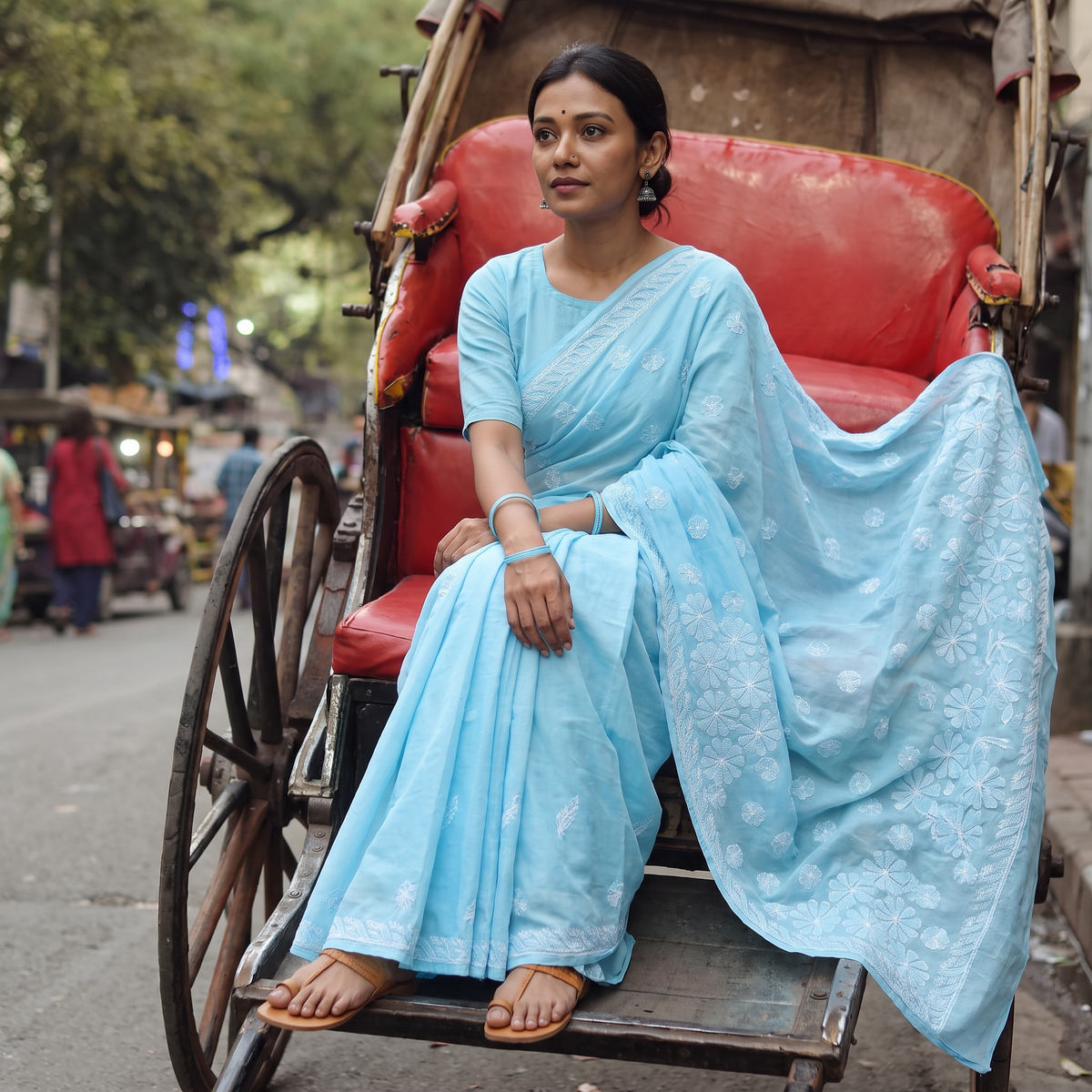 Blue Heavy Hand Embroidered Terivoile Cotton Lucknow Chikan Saree, draped and worn by a woman, AI visual of the saree, iTokri