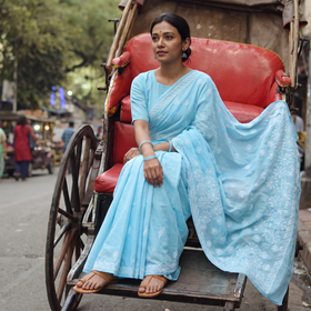 Blue Heavy Hand Embroidered Terivoile Cotton Lucknow Chikan Saree, draped and worn by a woman, AI visual of the saree, iTokri