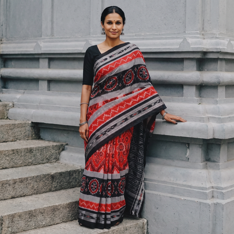 Multicolor Ikat Handloom Cotton Sambalpuri Saree, draped and worn by a woman, AI visual of the saree, iTokri