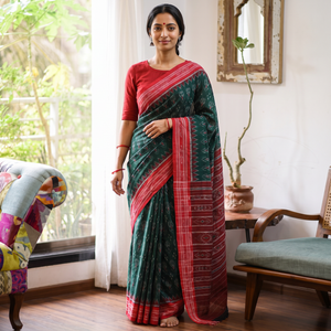 Green Ikat Handloom Cotton Sambalpuri Saree, draped and worn by a woman, AI visual of the saree, iTokri