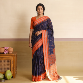 Blue Ikat Handloom Cotton Sambalpuri Saree, draped and worn by a woman, AI visual of the saree, iTokri