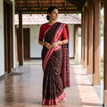 Brown Ikat Handloom Cotton Sambalpuri Saree, draped and worn by a woman, AI visual of the saree, iTokri
