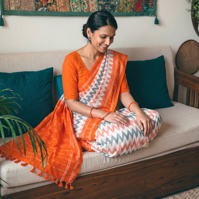 Multicolor Ikat Handloom Cotton Sambalpuri Saree, draped and worn by a woman, AI visual of the saree, iTokri