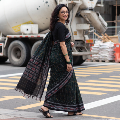 Green Ikat Handloom Cotton Sambalpuri Saree, draped and worn by a woman, AI visual of the saree, iTokri