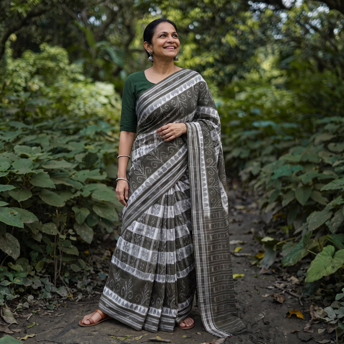 Grey Ikat Handloom Cotton Sambalpuri Saree, draped and worn by a woman, AI visual of the saree, iTokri