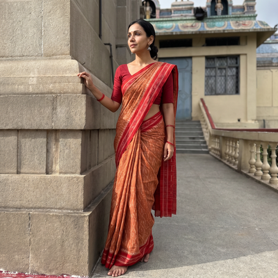 Brown Ikat Handloom Cotton Sambalpuri Saree, draped and worn by a woman, AI visual of the saree, iTokri