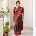 Green Ikat Handloom Cotton Sambalpuri Saree, draped and worn by a woman, AI visual of the saree, iTokri