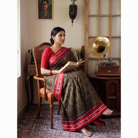 Green Ikat Handloom Cotton Sambalpuri Saree, draped and worn by a woman, AI visual of the saree, iTokri