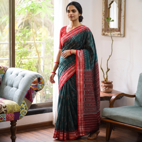 Green Ikat Handloom Cotton Sambalpuri Saree, draped and worn by a woman, AI visual of the saree, iTokri