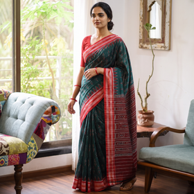 Green Ikat Handloom Cotton Sambalpuri Saree, draped and worn by a woman, AI visual of the saree, iTokri