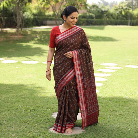 Brown Ikat Handloom Cotton Sambalpuri Saree, draped and worn by a woman, AI visual of the saree, iTokri