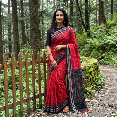 Red Ikat Handloom Cotton Sambalpuri Saree, draped and worn by a woman, AI visual of the saree, iTokri