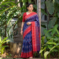 Blue Ikat Handloom Cotton Sambalpuri Saree, draped and worn by a woman, AI visual of the saree, iTokri