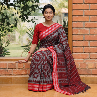 Maroon Ikat Weave Handloom Cotton Sambalpuri Saree, draped and worn by a woman, AI visual of the saree, iTokri