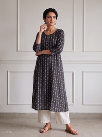 Black Jacquard Cotton Dotted Columns Kurta, worn by a woman for daily wear, also casual, office wear, AI visual of the kurta, iTokri