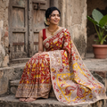 Red Kalamkari Printed Cotton Saree, draped and worn by a woman, AI visual of the saree, iTokri