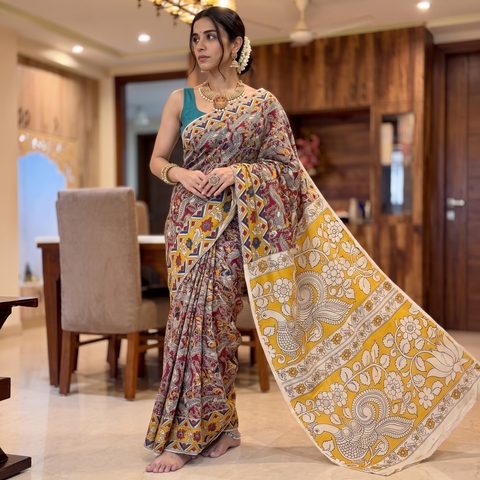 Multicolor Kalamkari Printed Cotton Saree, draped and worn by a woman, AI visual of the saree, iTokri