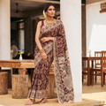 Maroon Kalamkari Printed Cotton Saree, draped and worn by a woman, AI visual of the saree, iTokri