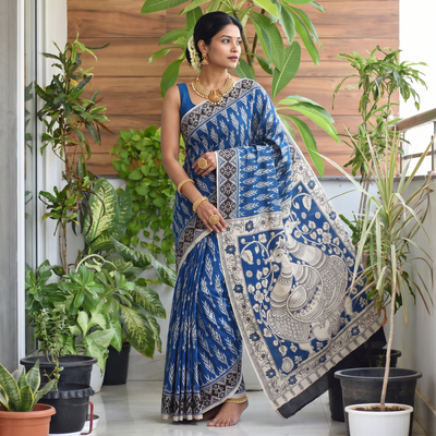 Blue Kalamkari Printed Cotton Saree, draped and worn by a woman, AI visual of the saree, iTokri