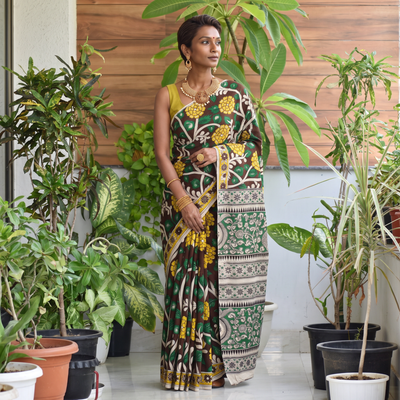 Multicolor Kalamkari Printed Cotton Saree, draped and worn by a woman, AI visual of the saree, iTokri