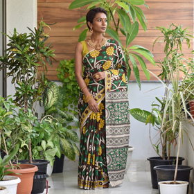 Multicolor Kalamkari Printed Cotton Saree, draped and worn by a woman, AI visual of the saree, iTokri