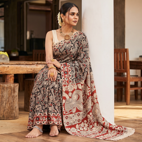 Black Kalamkari Printed Cotton Saree, draped and worn by a woman, AI visual of the saree, iTokri