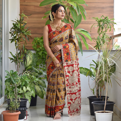 Multicolor Kalamkari Printed Cotton Saree, draped and worn by a woman, AI visual of the saree, iTokri