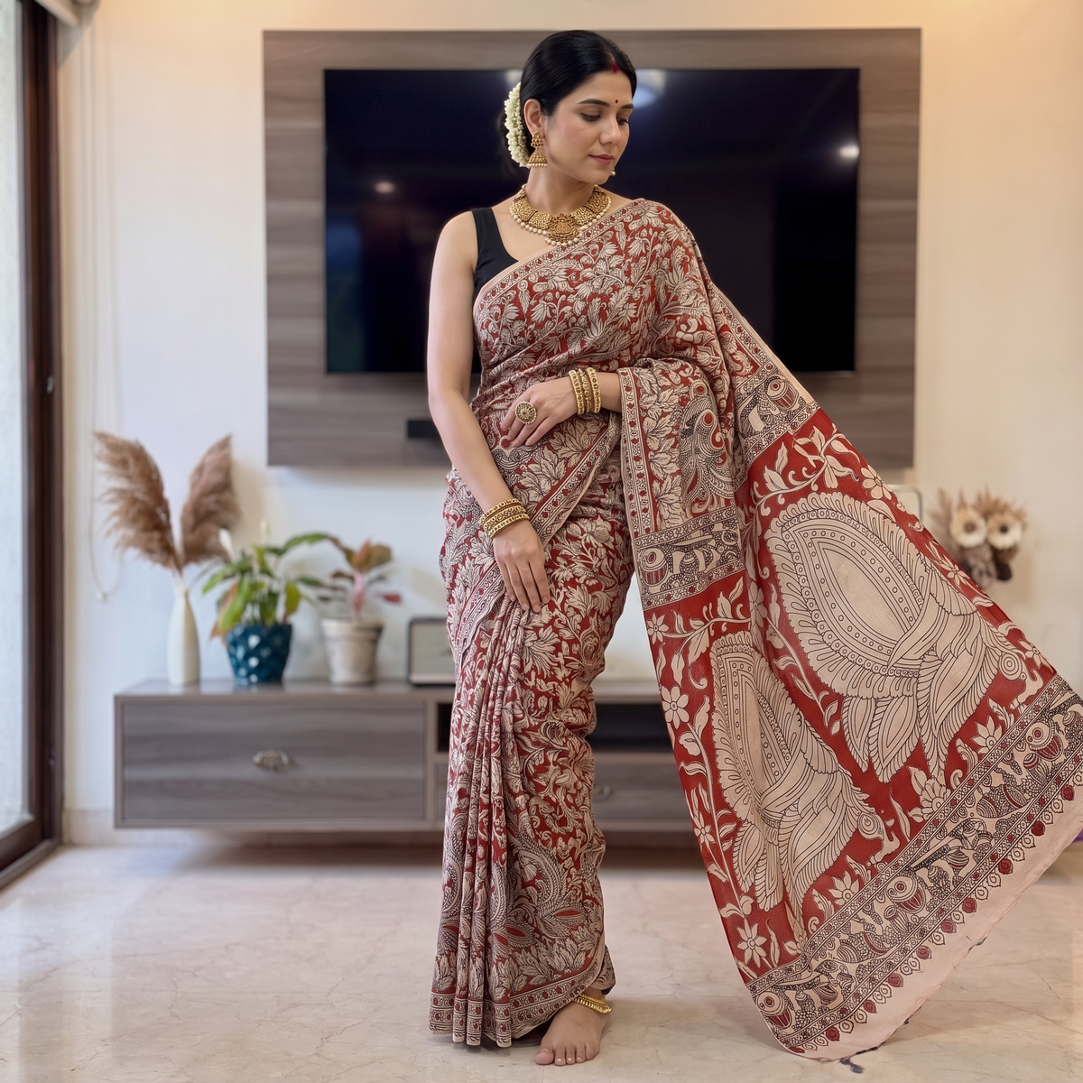 Red Kalamkari Printed Cotton Saree, draped and worn by a woman, AI visual of the saree, iTokri