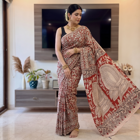 Red Kalamkari Printed Cotton Saree, draped and worn by a woman, AI visual of the saree, iTokri