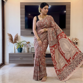 Red Kalamkari Printed Cotton Saree, draped and worn by a woman, AI visual of the saree, iTokri