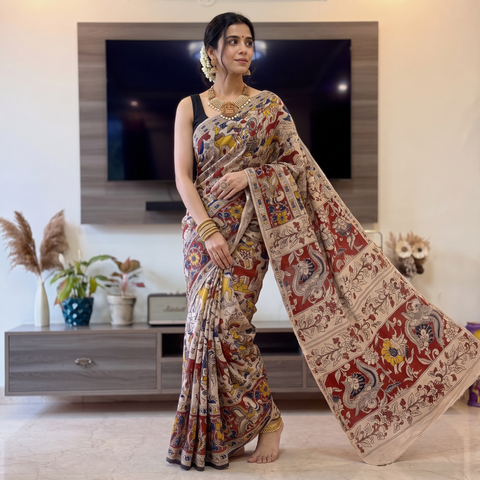 Multicolor Kalamkari Printed Cotton Saree, draped and worn by a woman, AI visual of the saree, iTokri