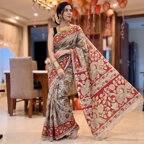 Beige Kalamkari Printed Cotton Saree, draped and worn by a woman, AI visual of the saree, iTokri