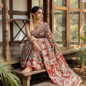 Multicolor Kalamkari Printed Cotton Saree, draped and worn by a woman, AI visual of the saree, iTokri
