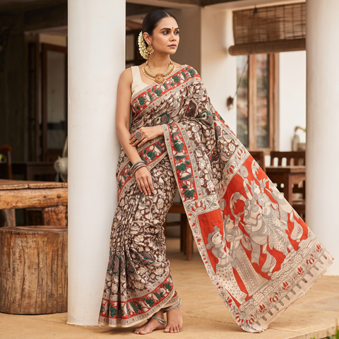 Beige Kalamkari Printed Cotton Saree, draped and worn by a woman, AI visual of the saree, iTokri