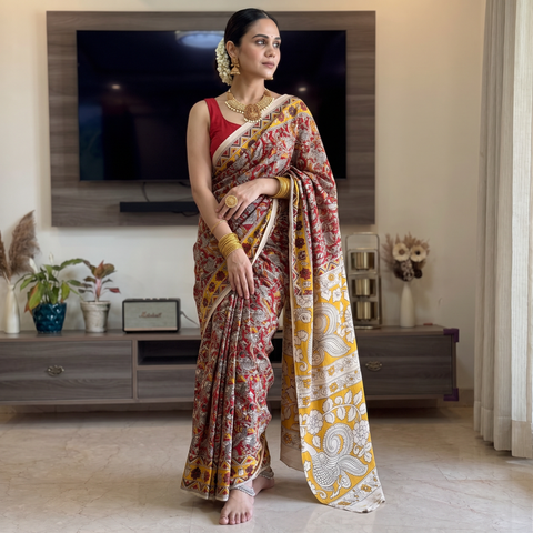 Red Kalamkari Printed Cotton Saree, draped and worn by a woman, AI visual of the saree, iTokri