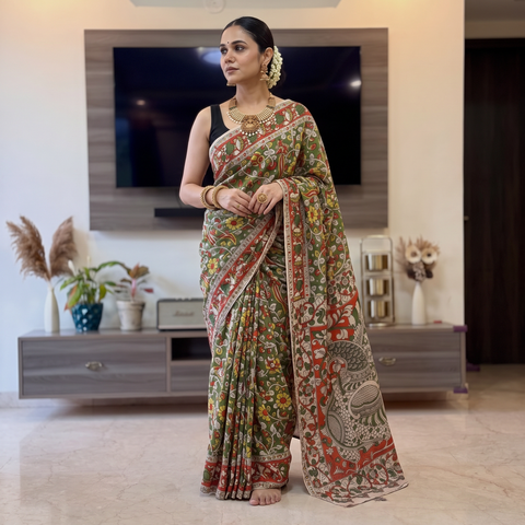 Green Kalamkari Printed Cotton Saree, draped and worn by a woman, AI visual of the saree, iTokri