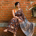 Brown Kalamkari Printed Cotton Saree, draped and worn by a woman, AI visual of the saree, iTokri
