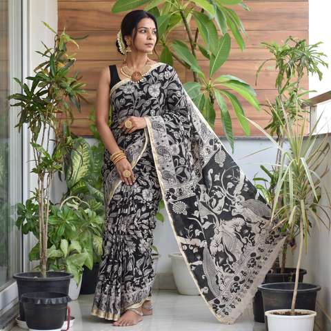 Black Kalamkari Printed Kota Doria Cotton Saree, draped and worn by a woman, AI visual of the saree, iTokri