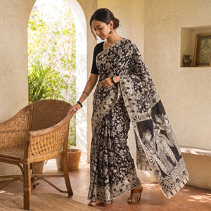 Black Kalamkari Printed Pure Cotton Saree, draped and worn by a woman, AI visual of the saree, iTokri