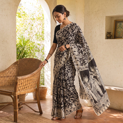 Black Kalamkari Printed Pure Cotton Saree, draped and worn by a woman, AI visual of the saree, iTokri