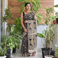 Black Kalamkari Printed Silk Cotton Saree, draped and worn by a woman, AI visual of the saree, iTokri