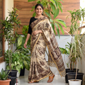 Beige Kalamkari Printed Silk Cotton Saree with Zari Border, draped and worn by a woman, AI visual of the saree, iTokri