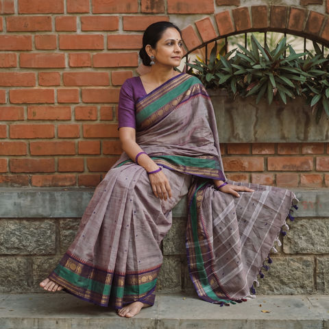 Purple Kanchipuram Buti Cotton Saree with Border, draped and worn by a woman, AI visual of the saree, iTokri
