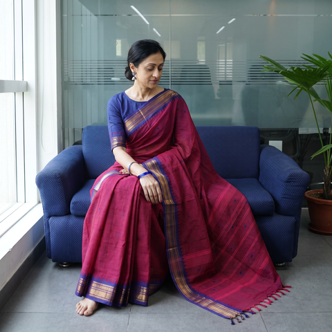 Pink Kanchipuram Buti Cotton Saree with Border, draped and worn by a woman, AI visual of the saree, iTokri