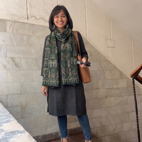 Green Kani Weave Zari Jaal Fine Wool Stole, worn by a woman, AI visual of the stole, iTokri